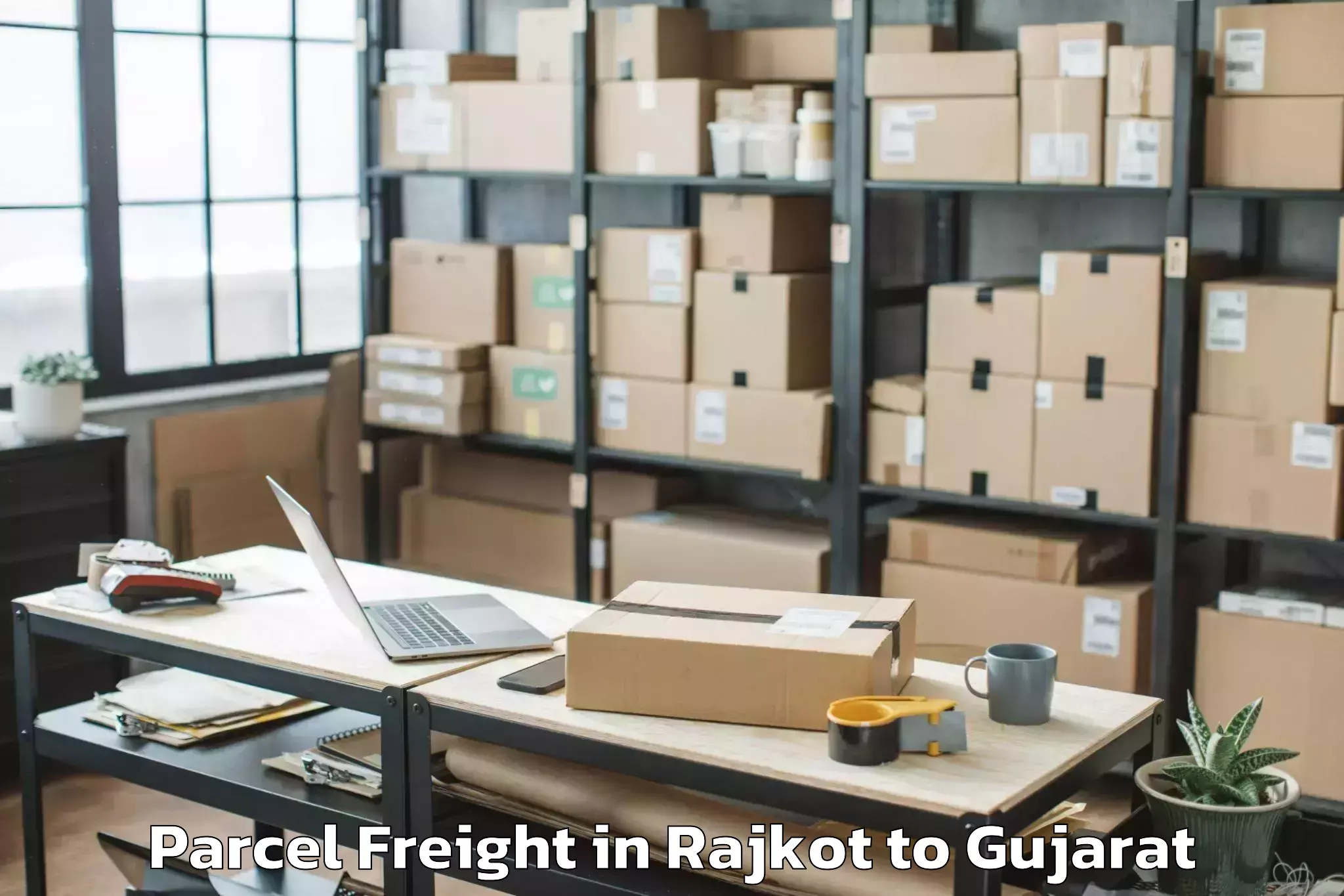 Book Rajkot to Abdasa Parcel Freight